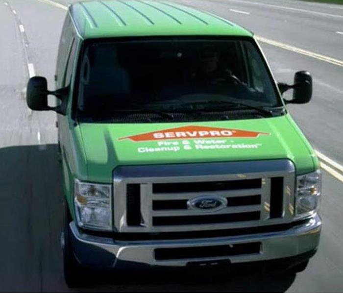 SERVPRO van driving towards you on the road