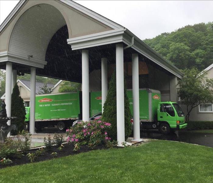 servpro trucks in front of commercial fire damage loss