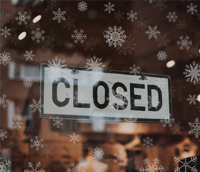closed sign with snowflakes