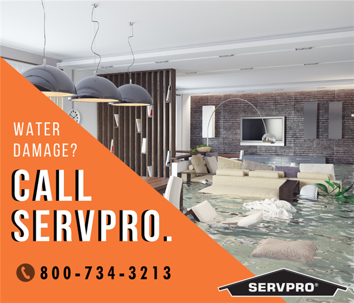 water filled living room with text: water damage? call servpro. 800-734-3213